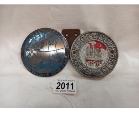 An Internation Motor Cyclists tour club and a Eboracum Motor Club car badges.