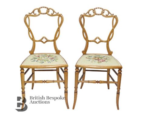 Four White &amp; Co Ltd rosewood dining chairs, with decorative carving on splade legs, original upholstery together with two