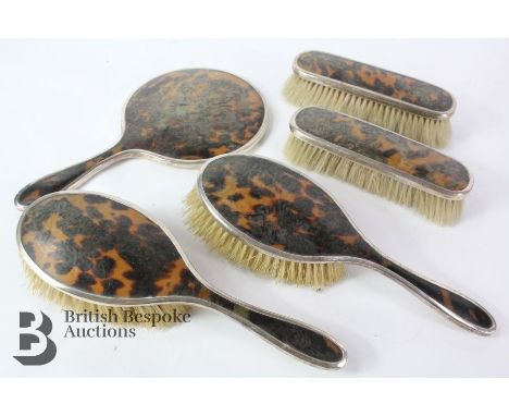Silver and tortoiseshell vanity set comprising mirror, two hairbrushes and two clothes brushes, Birmingham hallmark dated 192