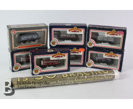 Six Bachmann 00 gauge scale carts and wagons incl. Wigan Coal Manton, Shireoaks, Dinnington, Rossington, and a Dapol 00 gauge