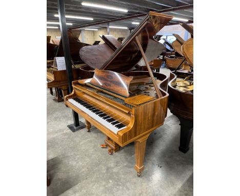 Steinway (c1981)A 5ft 10in Model O grand piano in a rosewood case on square tapered legs; together with a stool. AMENDMENT Ha