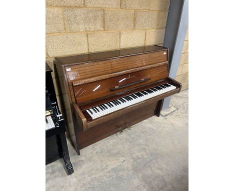 Steinway (c1969) A Model Z upright in a bright mahogany case. 