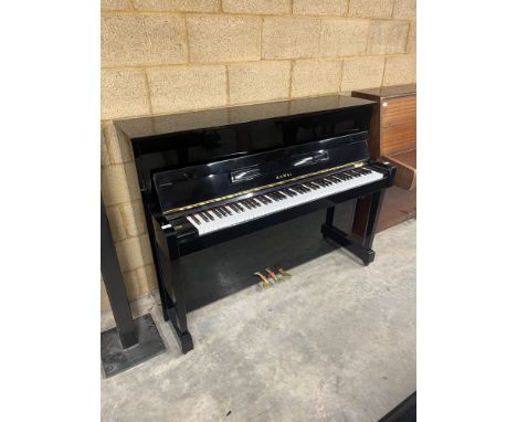Kawai (c2002) A Model K-18E upright piano in a traditional bright ebonised case. 