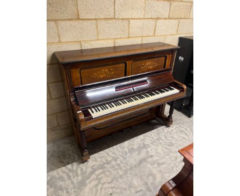 Steinway (c1900) A Model EE upright piano in a traditional rosewood case; together with a stool. IRN:&nbsp;4HQZPTPD 