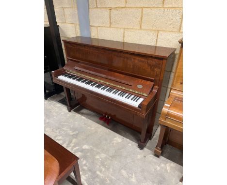 Steinway (c2003) A Crown Jewel Series Model 1098 upright piano in a bright mahogany case; together with a matching stool.&nbs