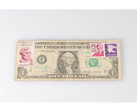  Andy Warhol - Dollar Bill, 1985 Black marker on a US dollar bill with postage stamp and ink ink indicating it has been sent 