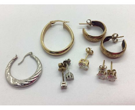 A Pair of 9ct Gold Vintage Style Hoop Earrings, with chased foliage design, together with a single/odd creole hoop earring st