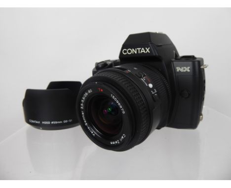 Contax NX Camera, 28-80 Vario Sonnar Lens (nof - tested), together with instruction book.