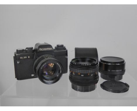 Rolleiflex SL35E Camera and Lenses, 55/1.4 Rolleinar, 28/2.8 Makinon, 2 x Converter together with instruction booklets.