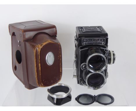 Tele-Rolleiflex Camera, case, lens hood, edge balsam faults, (tested).