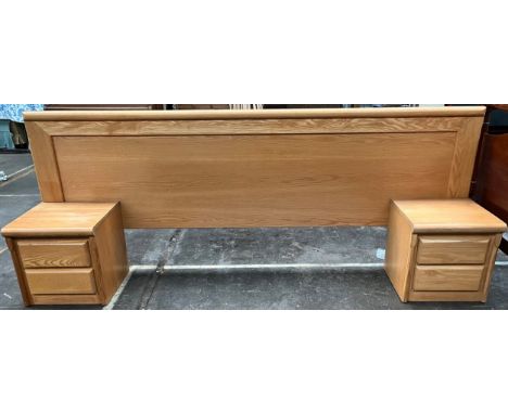 Mid century light wood headboard with attached bedside cabinets. Possibly Danish. 