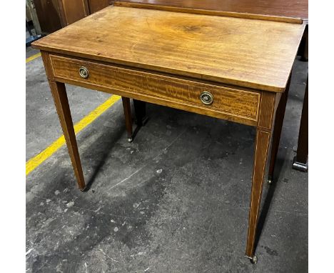 19th century console/ writing desk with single frieze drawer, supported on square tapered legs and brass castor feet. 