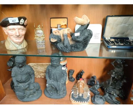 Two shelves of collectables to include Royal Doulton Toby Jug, ink well stand, Lladro sign and various figures etc 