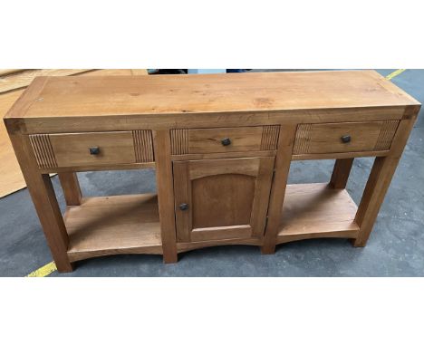 Solid light wood contemporary sideboard, centre door opens to reveal a wine rack 