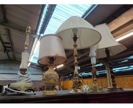 Five various table lamps to include a hand carved oak barley twist table lamp 