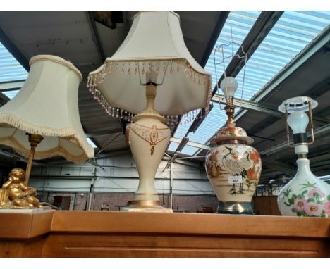 A Lot of four table lamps to include Japanese crane design lamp and cherub gold painted base lamp 
