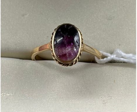 Antique 9ct gold and Amethyst stone ring. [Stone has various cracks showing- possibly raw amethyst] [Ring size P] [2.69GRAMS]