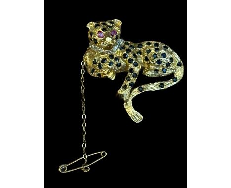 9ct Gold pin brooch with safety chain 'Wallis Simpson style' Panther incrusted diamonds, sapphires & ruby eyes. Weight 11g