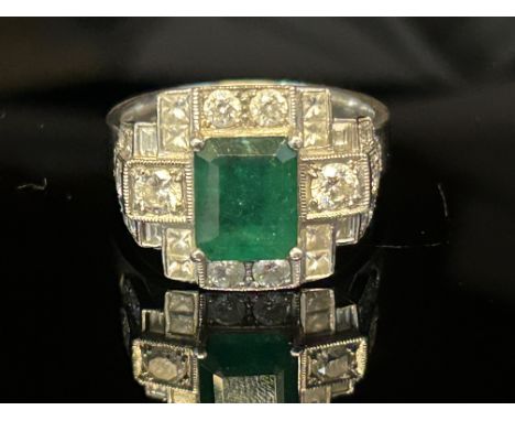 Large platinum ring set with approx. 2.25 carat diamond Princess cut, brilliant & baguette diamonds. Colour/s K-M. Clarity SI