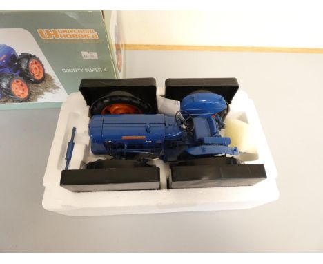 Universal Hobbies&nbsp;1:16th scale die-cast County Super 4 Tractor finished in blue and orange paint. Complete with box and 