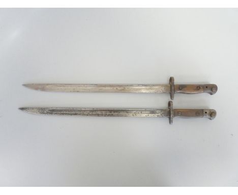 Two British 1907 Pattern bayonets both Wilkinson examples dating to 1918. Lacking scabbards. Length 53.5cm.&nbsp;(2)