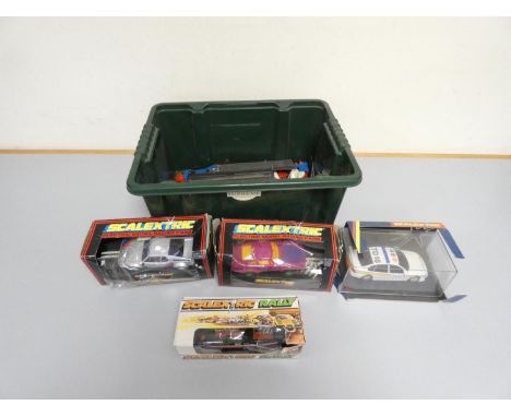 Box of Scalextric model cars to include Joker's Porsche C.466, BMW M1 C.405, and others.