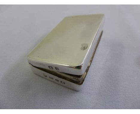 A late Victorian silver snuff box, plain rectangular with hinged cover, Birmingham 1899
