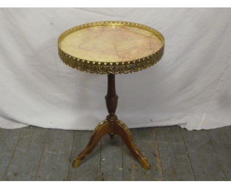 A French style marble top side table with gilt metal gallery on tripod base