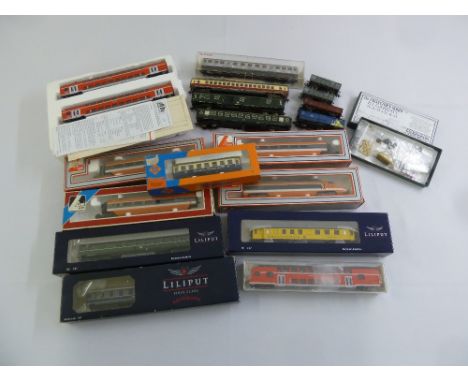 A quantity of HO gauge model railway carriages and rolling stock to include Roco, Liliput, Lima, Rivarossi and Fleischmann  (