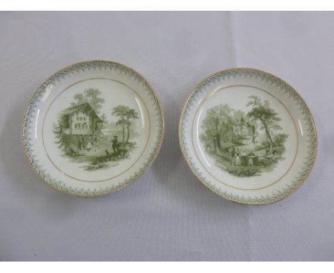 A pair of Victorian porcelain decorative plates