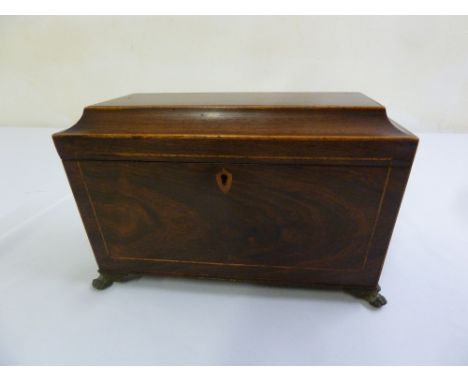 A Victorian mahogany tea caddy, sarcophagus form with satinwood stringing, cast brass eagle swing side handles and raised hin