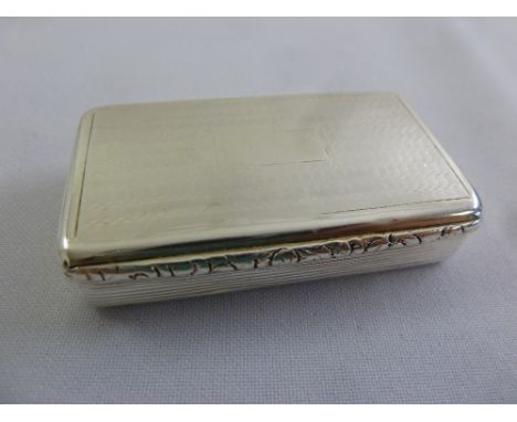 A Georgian silver snuff box, rounded rectangular, ribbed sides, engine turned cover, Birmingham 1827