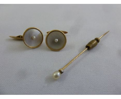 A pair of 14ct gold cufflinks and a gold stick pin