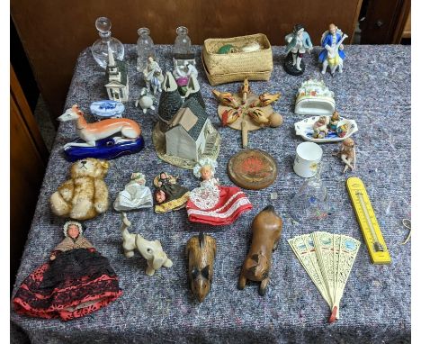 Collectables to include a Steiff bear, a Staffordshire dog pen holder, a glass bell, continental figures and other itemsLocat
