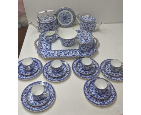 A 19th century Royal Crown Derby teaservice in the Wilmot pattern to include two teapots, a set of six side plates, cups and 