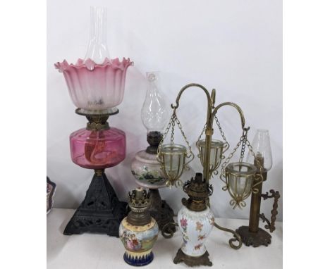 A mixed lot to include a Victorian oil lamp with a cranberry glass shade and reservoirLocation:If there is no condition repor