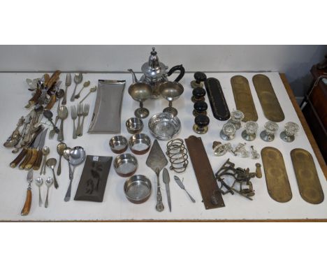 Metalware and silver plate to include a range of flatware, vintage door knobs, trays, teapots, goblets and other itemsLocatio