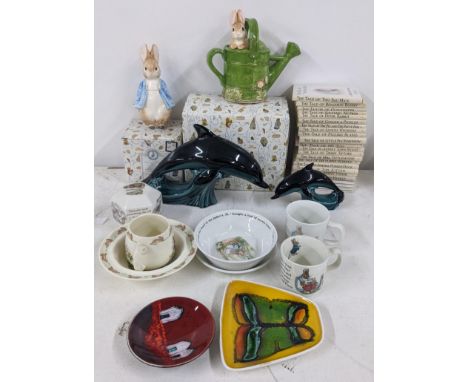 A mixed lot to include Poole pottery, Beatrix potter porcelain and a set of books