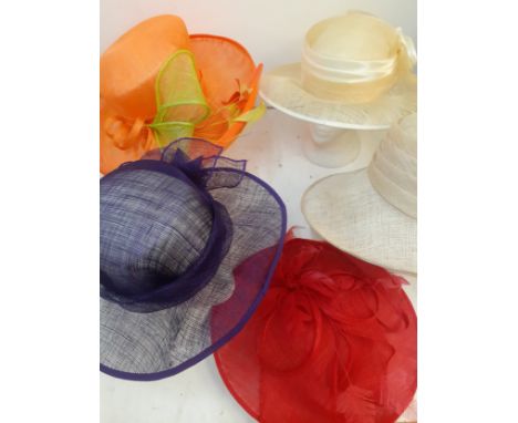 A group of 11 ladies formal straw hats and hatboxes to include a Gina Bacconi orange straw hat with green straw bow and feath