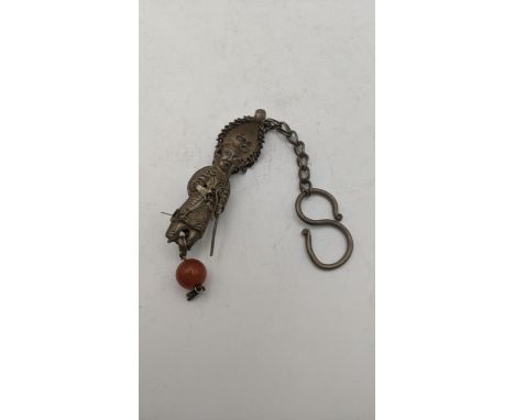 A Chinese silver chatelaine figure, approx 9cm long excluding chain, 20.3gLocation: If there is no condition report shown, pl