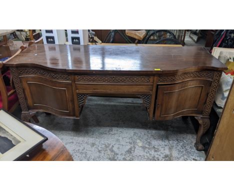 A mixed lot of furniture to include a 1920s serpentine fronted sideboard, single drawer over two cupboard doors on ball and c