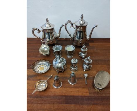 Silver plate to include a teaset, a pepper grinder and other items, along with a tea strainer, 32gLocation:If there is no con