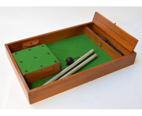 A vintage table skittles game