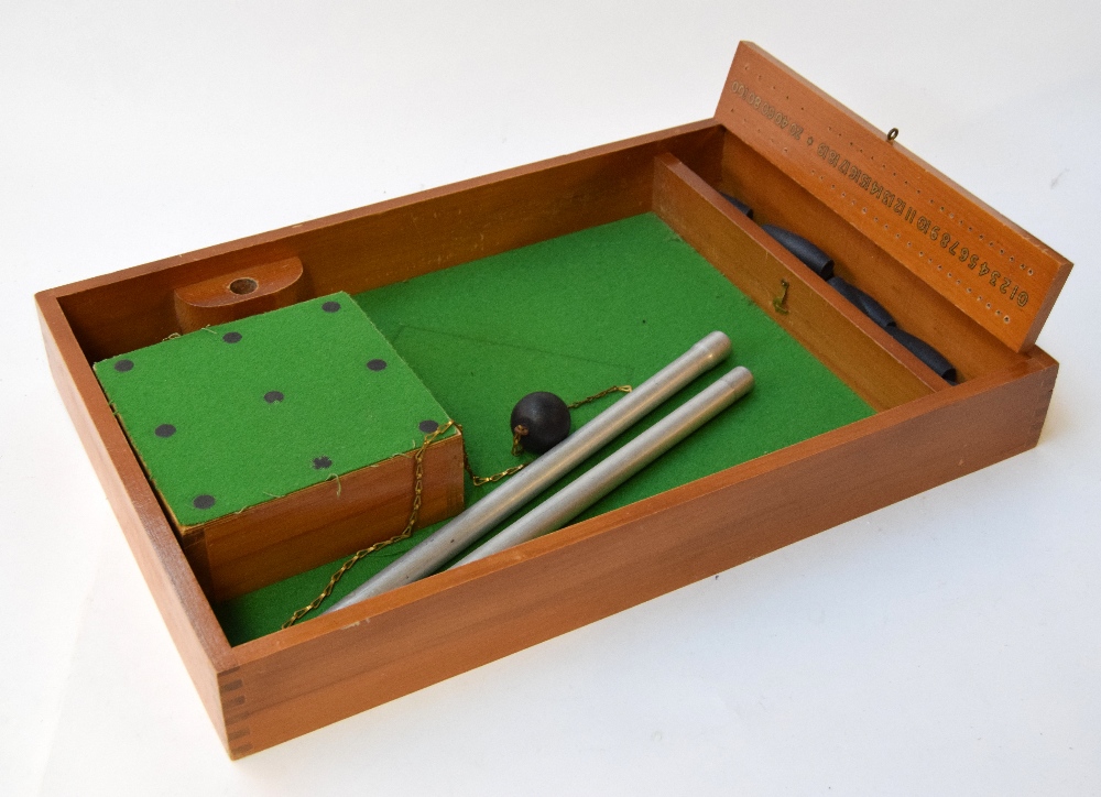 A vintage table skittles game