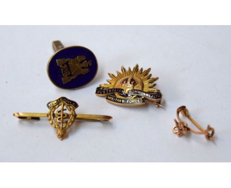 A 9ct gold and enamel regimental badge reading 'Australian Commonwealth Military Forces', a 9ct gold and enamel regimental ba