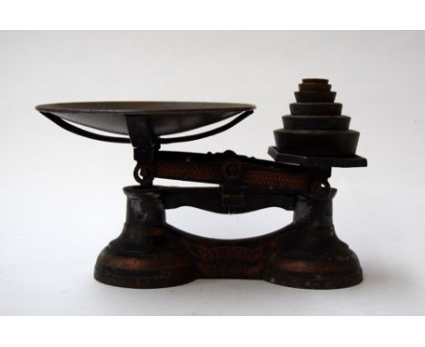 A set of cast iron 'Standard J. Garland & Co' scales with weights