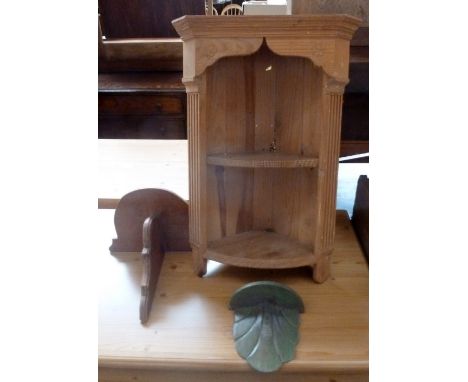 A small pine corner cupboard with one shelf together with two small wall shelves