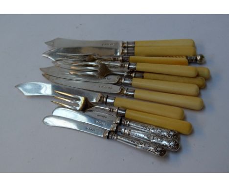 A selection of silver cutlery: 6 fish knives,  4 forks, 3 butter knives and a toasting fork