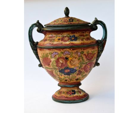 A large two handed ceramic urn decorated with flowers 49cmH