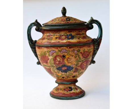 A large two handed ceramic urn decorated with flowers 49cmH